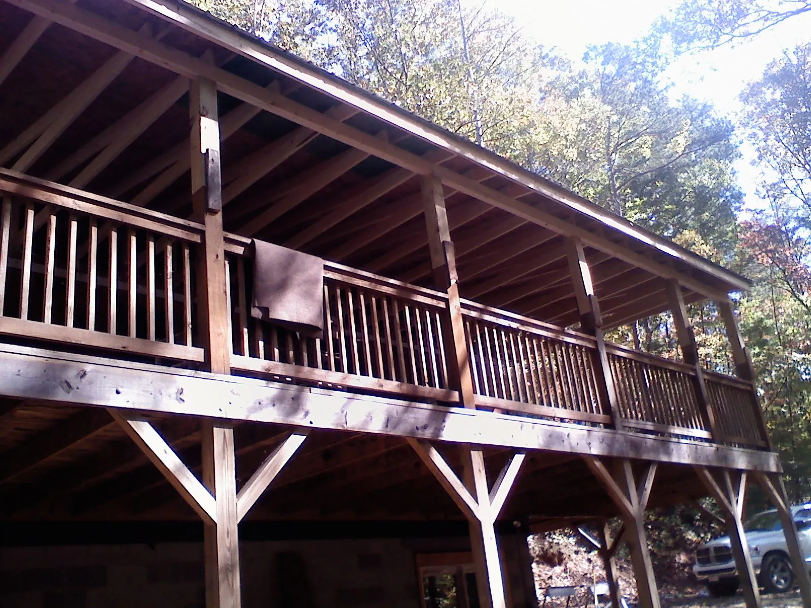 Timber framing under a new elevated porch and deck — Roof Leak Repair in Green Camp by Roofing Brothers